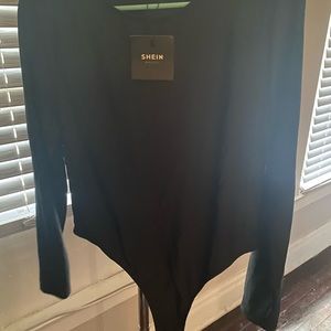 Body suite, black, never worn.